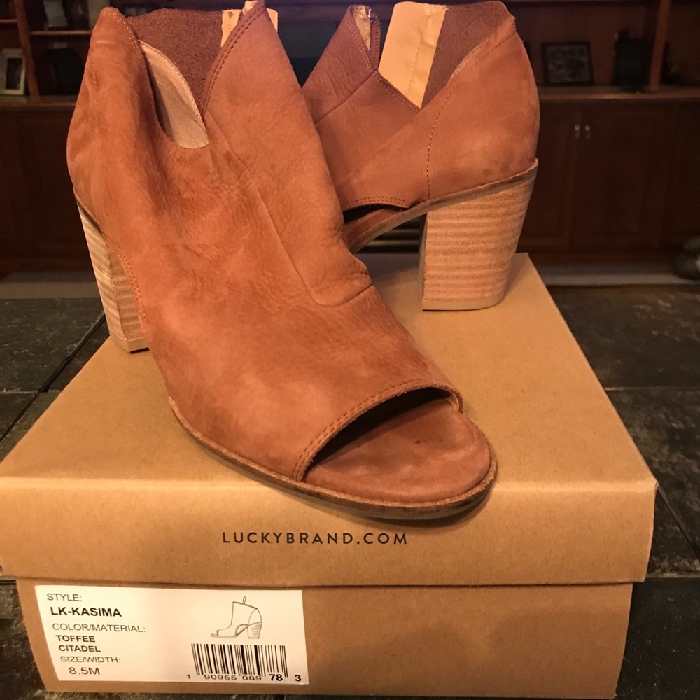 Open toe boot shoe.